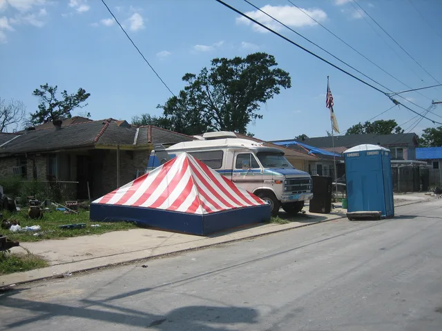Holy Cross neighborhood of the Lower 9th Ward of New Orleans : resident back living in the formerly flooded neighborhood 7 months after Hurricane Katrina with tent, van, and portable toilet. (Formerly flooded buildings that may look not too badly damaged from the exterior often have significant inte. Water restoration software reviewed: match it to your payers