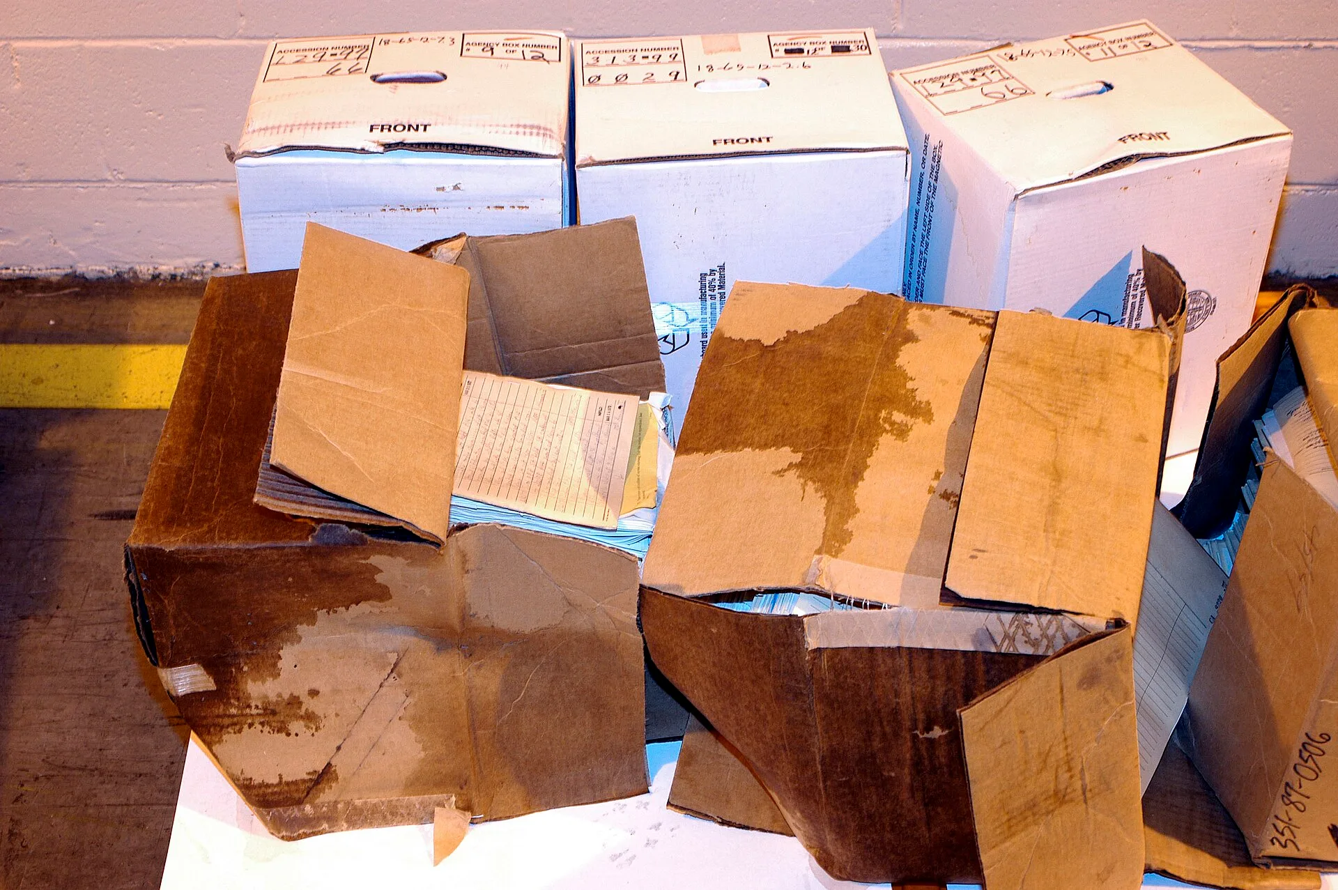 Water Damage to Records and Archives at Suitland, MD. How a Canadian water damage restoration business bills insurers