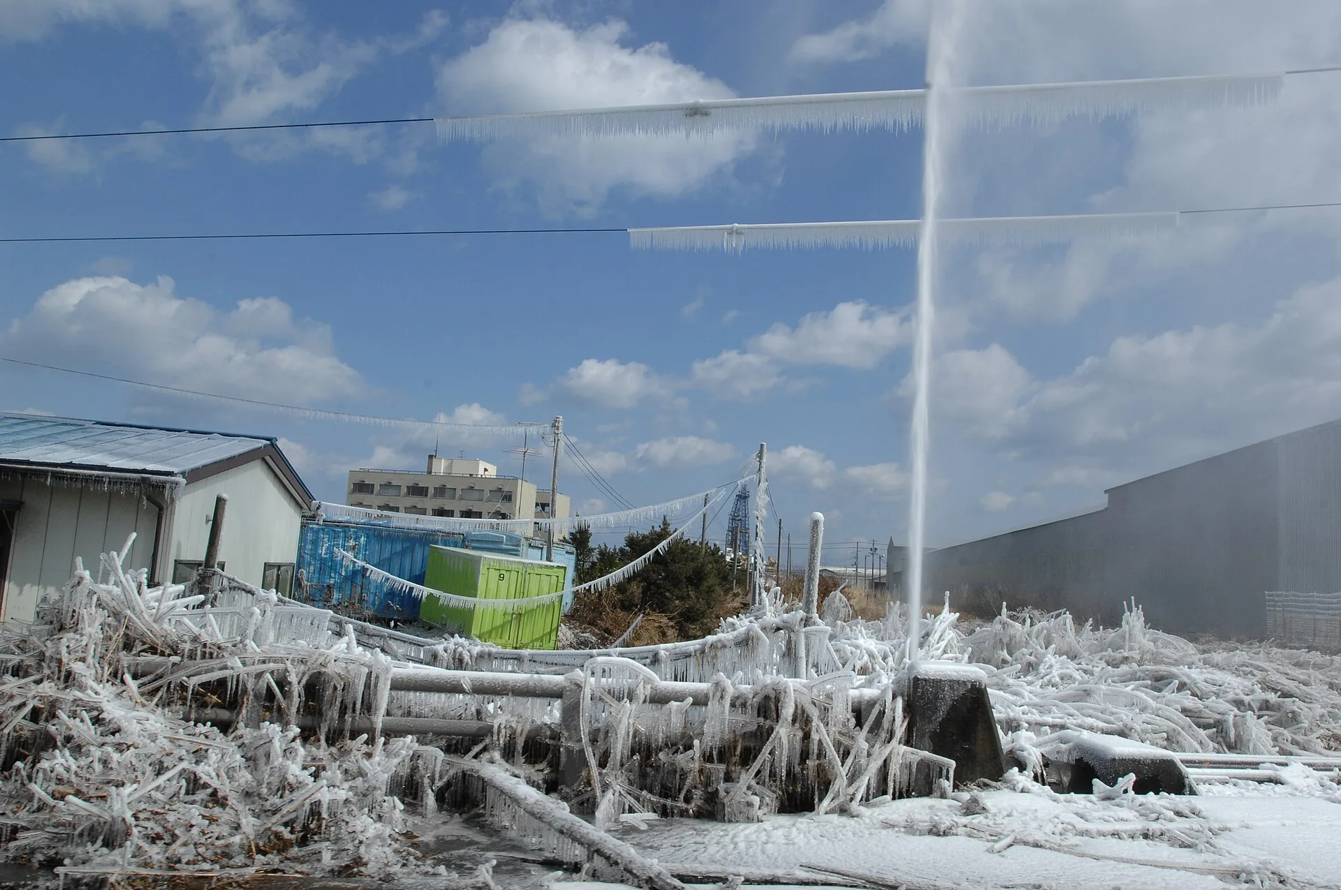 A damaged water pipe shoots into the air after a tsunami triggered by a 9.0 magnitude earthquake off the Northeastern coast of Japan . The earthquake was the strongest ever recorded in Japan, which caused considerable damage to the country's eastern coastline. Frozen pipe burst water mitigation: cold-weather steps