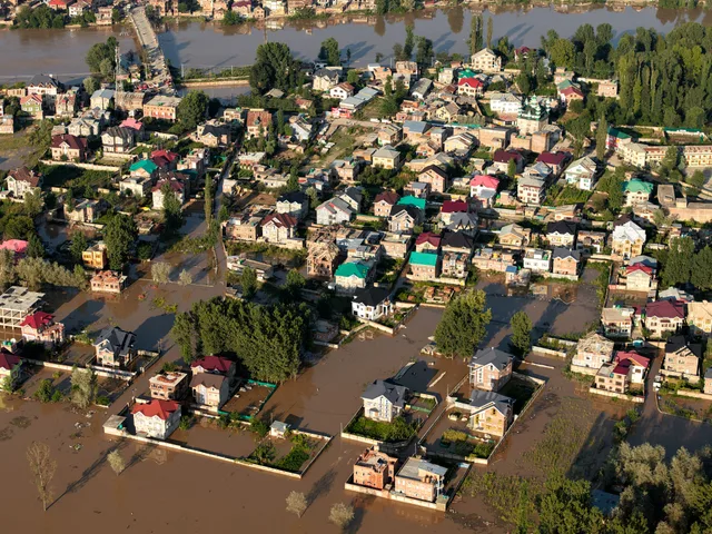 Aerial view showing extensive flooding in an urban area of Kashmir, India. Do Ontario, Quebec, BC and Alberta Require a Water Damage Restoration License?