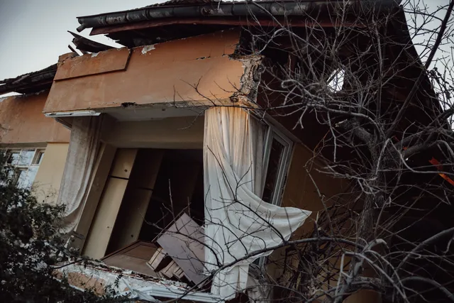 Exterior of a damaged house showing destruction from a natural disaster. What a water restoration business plan should contain and what to leave out